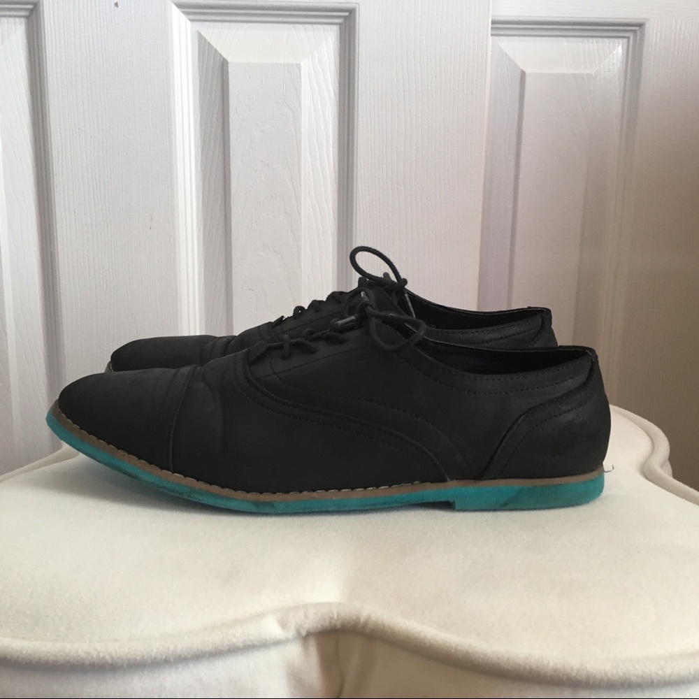 Black oxfords blue sole